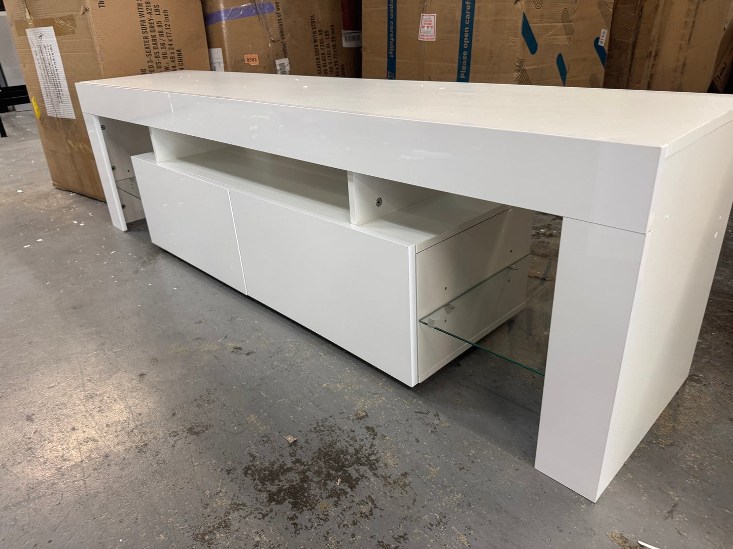 New white Tv stand with glass shelf’s draws and LED lights