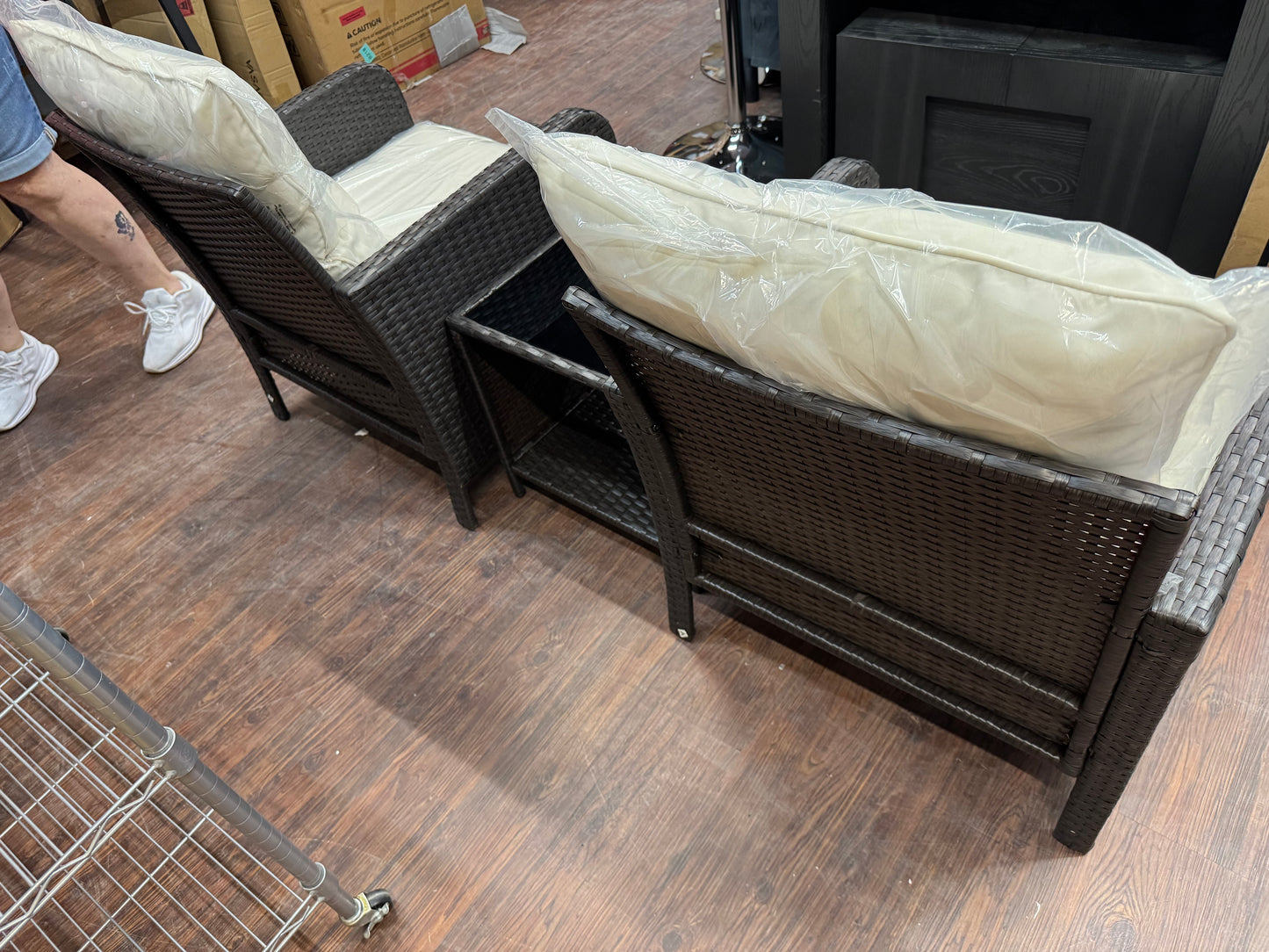 Patio furniture 2 chairs table and foot stools.