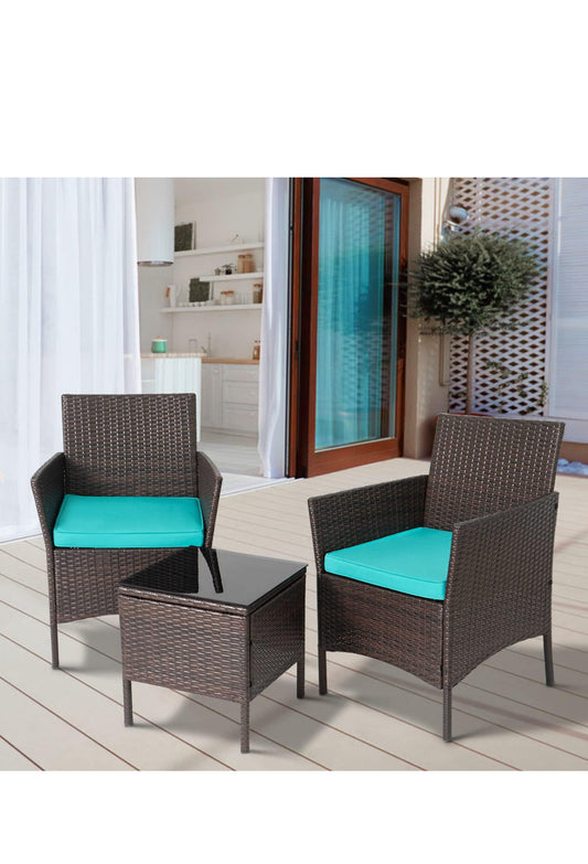 Outdoor patio set chairs and table with cushions in teal